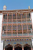 Ladakh - Hemis Gompa, the main monastery halls with the characteristc red painted windows and woden balconies on white washed faades